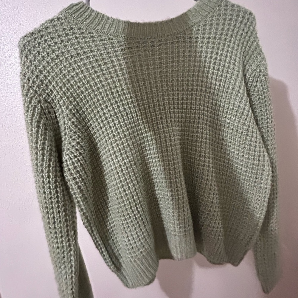 green knit sweater